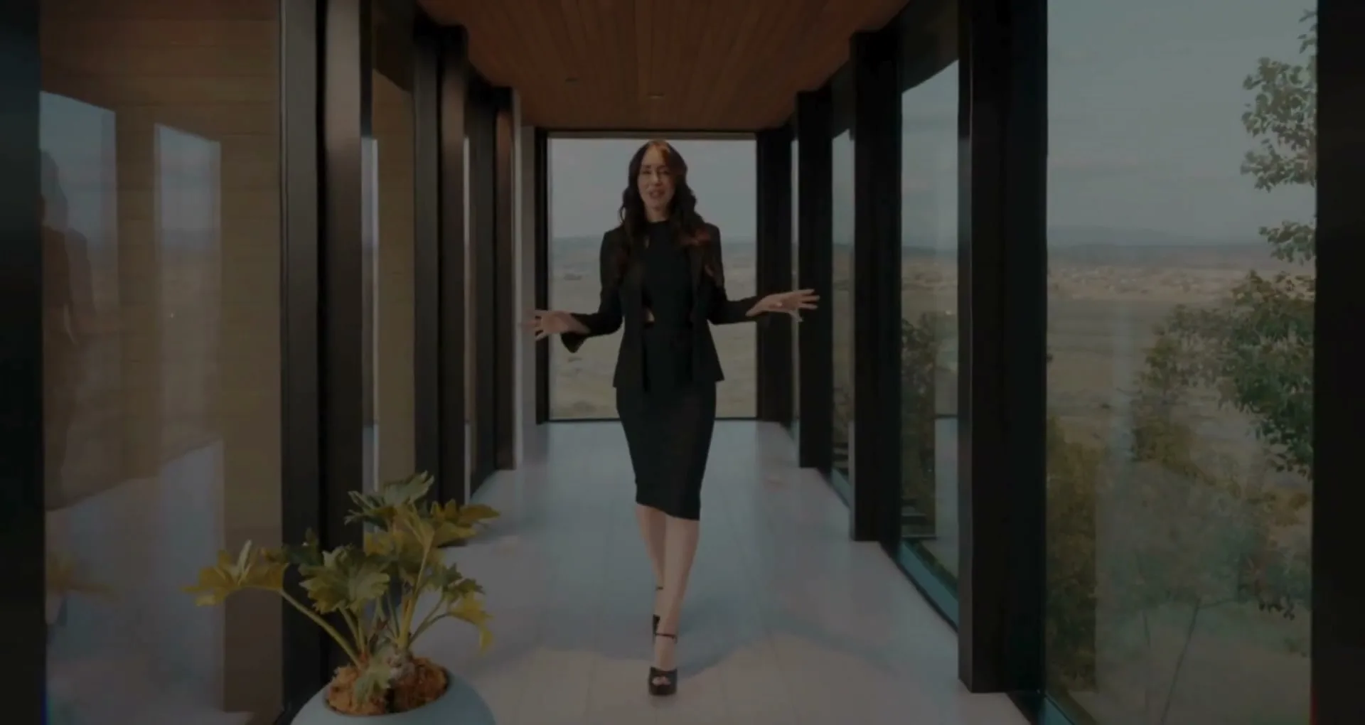 Kamee Shrope walking through a Utah luxury home